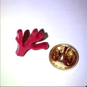 - Isaia lapel pin.